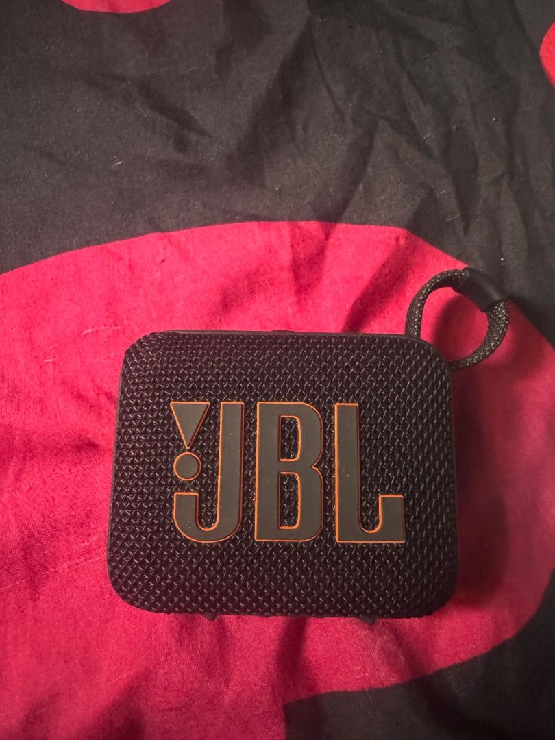 JBL GO 4 Portable Waterproof Bluetooth Speaker (Category: Soundbars, Speakers & Amplifiers) located in Quezon City. Submitted by dragoncalm_021.369 (Listing ID 1460899898, Image 1). Description: - JBL GO 4 Speaker in Black with Orange JBL logo - Ultra-portable and compact design - Built-in loop for easy attachment to bags or backpacks - Waterproof and dustproof for worry-free outdoor use - Delivers surprisingly big sound for its small size - Idea