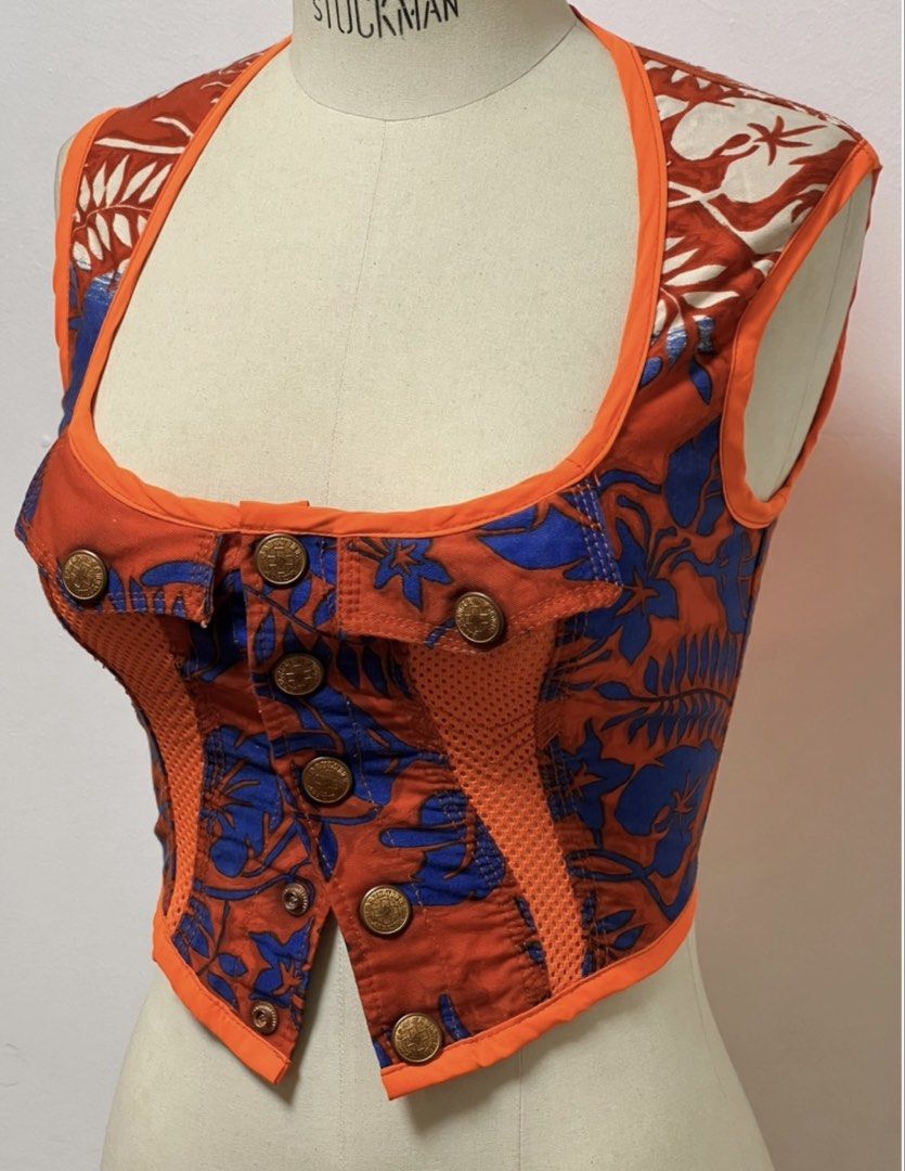 Jean Paul Gaultier corset top (Category: Luxury Apparel) located in Quezon City. Submitted by raccoonfur (Listing ID 1460757483, Image 3). Description: Iconic corset gilet from the 90’s/y2k by Gaultier. Cross referencing multiple motifs. Hawaiian print mixed with baseball jersey netting mixed with corset panelling mixed with a traditional gilet. A truly definitive piece that is unashamedly of its time. Great condition. Has rigid boning on side se
