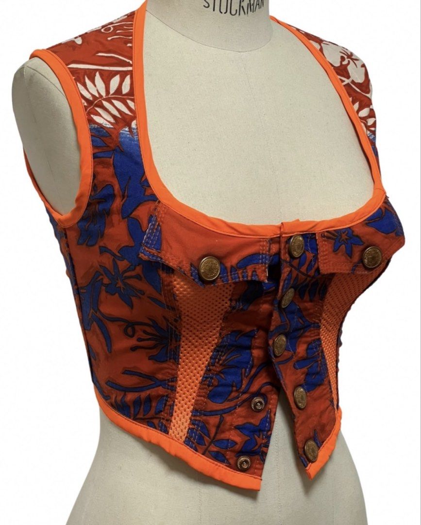 Jean Paul Gaultier corset top (Category: Luxury Apparel) located in Quezon City. Submitted by raccoonfur (Listing ID 1460757483, Image 1). Description: Iconic corset gilet from the 90’s/y2k by Gaultier. Cross referencing multiple motifs. Hawaiian print mixed with baseball jersey netting mixed with corset panelling mixed with a traditional gilet. A truly definitive piece that is unashamedly of its time. Great condition. Has rigid boning on side se
