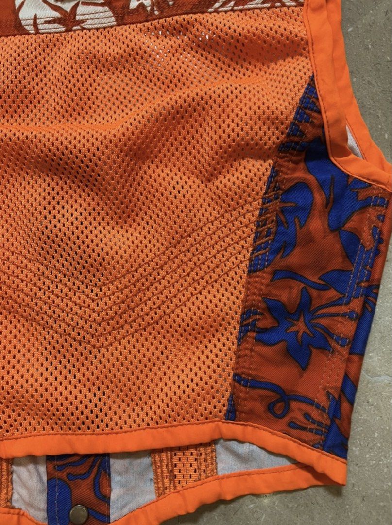 Jean Paul Gaultier corset top (Category: Luxury Apparel) located in Quezon City. Submitted by raccoonfur (Listing ID 1460757483, Image 2). Description: Iconic corset gilet from the 90’s/y2k by Gaultier. Cross referencing multiple motifs. Hawaiian print mixed with baseball jersey netting mixed with corset panelling mixed with a traditional gilet. A truly definitive piece that is unashamedly of its time. Great condition. Has rigid boning on side se