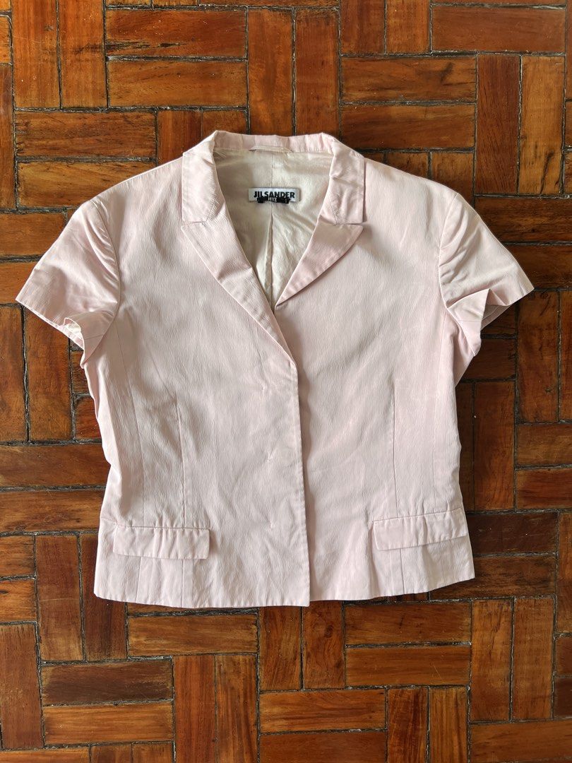 Jil Sander by Raf Simons dull satin blazer top (Category: Luxury Apparel) located in Quezon City. Submitted by raccoonfur (Listing ID 1460842459, Image 3). Description: Bubble gum pink tailored blazer top by Raf Simons for Jil Sander. Beautiful construction and material. No visible damage. Flat measurements: Pit to pit 44.5cm Waist 41cm Length 50.5cm Shoulders 41cm Sleeve length 14cm.