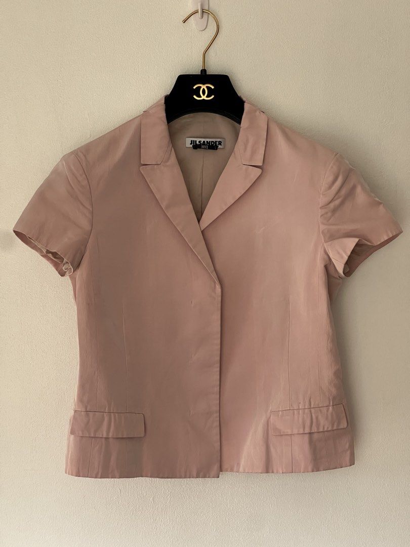 Jil Sander by Raf Simons dull satin blazer top (Category: Luxury Apparel) located in Quezon City. Submitted by raccoonfur (Listing ID 1460842459, Image 1). Description: Bubble gum pink tailored blazer top by Raf Simons for Jil Sander. Beautiful construction and material. No visible damage. Flat measurements: Pit to pit 44.5cm Waist 41cm Length 50.5cm Shoulders 41cm Sleeve length 14cm.