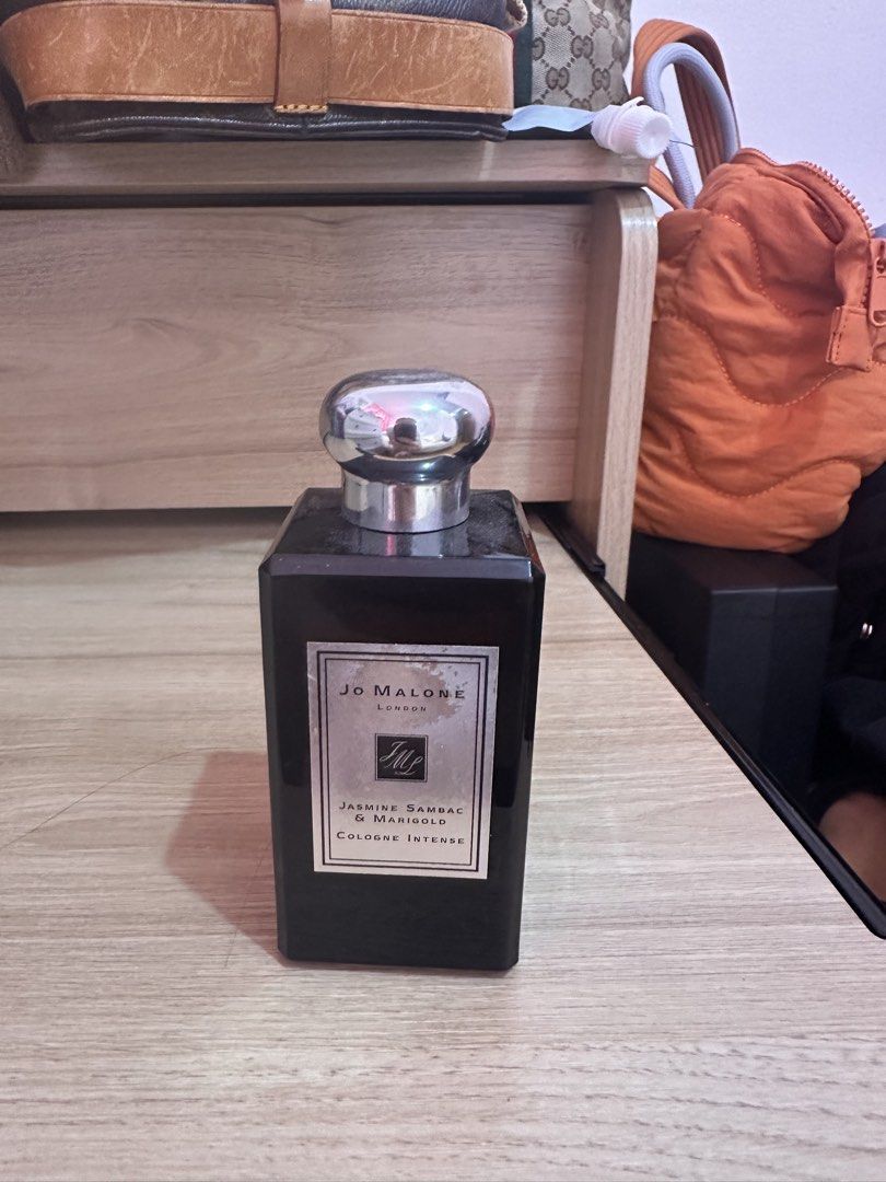 Jo Malone Jasmine Sambac & Marigold Cologne Intense (Category: Fragrance & Deodorants) located in Antipolo. Submitted by ririwearph (Listing ID 1460837077, Image 1). Description: - Jo Malone London Jasmine Sambac & Marigold Cologne Intense - Dark glass bottle with silver cap - Sophisticated floral fragrance - Versatile for everyday or special occasions - Bottle is full but no inclusions .