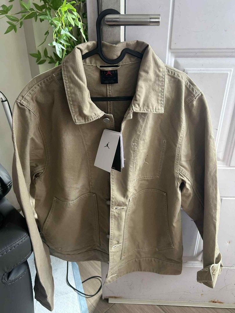 Jordan Utility Jacket Tan Khaki (Category: Coats, Jackets and Outerwear) located in Cavite. Submitted by cocorancho (Listing ID 1460716042, Image 1). Description: - Jordan utility jacket - Tan/khaki color - Button-up front - Two chest pockets - Two large front pockets - Jordan branding on chest - Tag inside with branding - Perfect for casual outfits.