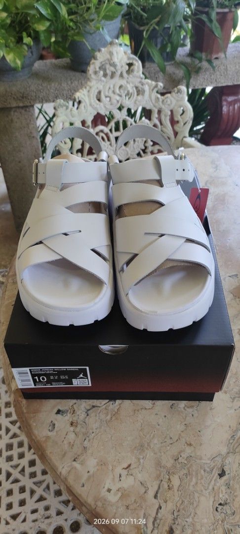 Jordan Willow Platform Sandals (Category: Flats & Sandals) located in Manila. Submitted by acdouble-r (Listing ID 1460717387, Image 1). Description: - White Jordan sandals - Strappy design - Platform sole for added height - Buckle closure at ankle strap - Includes original box - Size: 10 (US Women's).