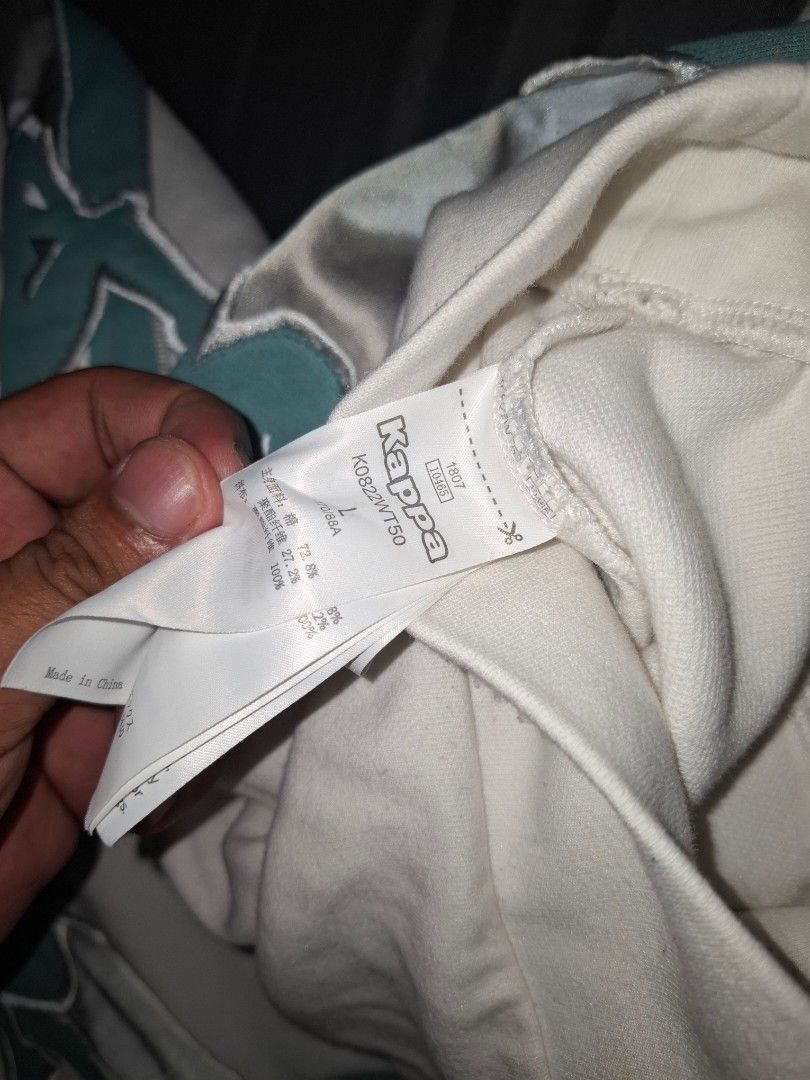 Kappa SS18 "BANDA" white crewneck (Category: Coats, Jackets and Outerwear) located in Bacoor. Submitted by manilasena (Listing ID 1460891770, Image 3). Description: Yellow in neck line plus need Wash Size L on tag Cropped.