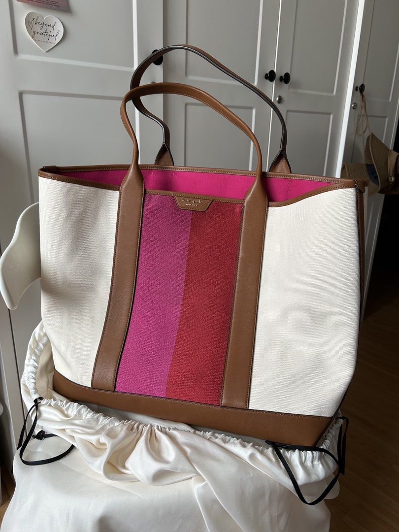 Kate Spade canvas Racing Stripe tote (Category: Tote Bags) located in Marilao. Submitted by clearance4acause.1 (Listing ID 1460801543, Image 1). Description: In very good condition hardly noticeable signs of use. due to size … item is only for pick up. XL bag *pwede pa sa maselan..
