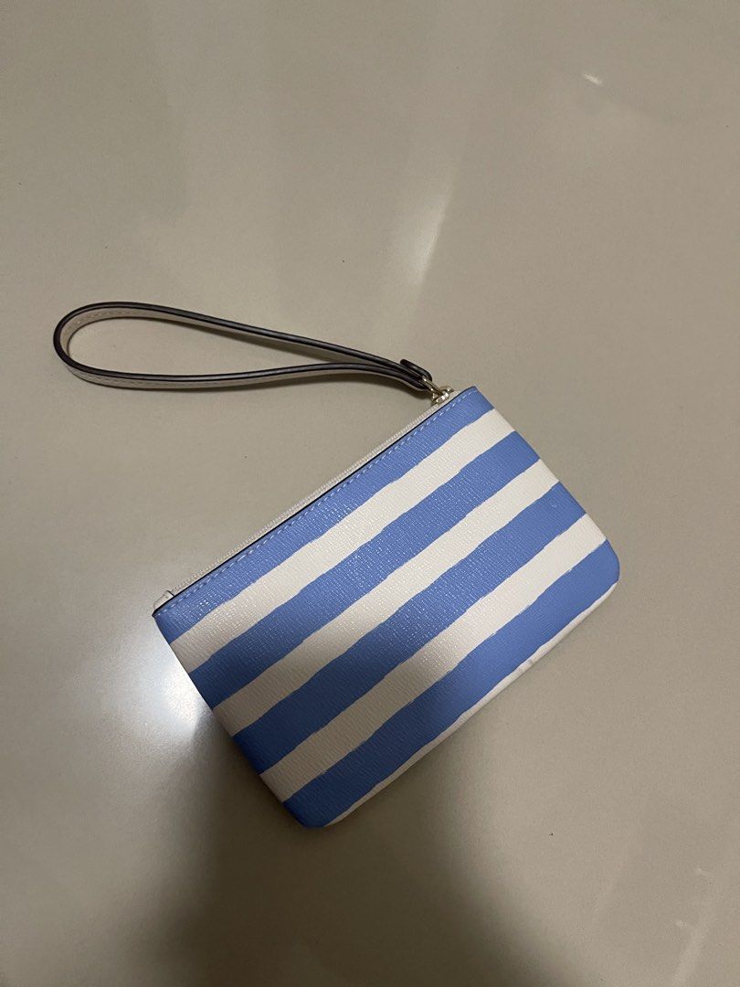 Kate spade wrislet (Category: Wallets & Card holders) located in Paranaque City. Submitted by graceshanp (Listing ID 1460885513, Image 2). Description: - New just opened but no plastic or box with it that's why sold cheaper - RFS: too much wristlet - Small and compact - no issues, its brand new .