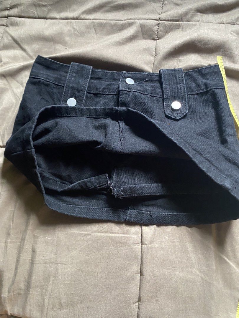 Kendall Black Denim Mini Skirt (Category: Skirts) located in Caloocan City. Submitted by lienzonius (Listing ID 1460727577, Image 3). Description: - Classic black denim mini skirt - Two front pockets and two back pockets - Belt loops at the waist - Button and zip closure - Approx. 13 inches in length - Approx. 28 inches in waist - Ideal for casual wear.