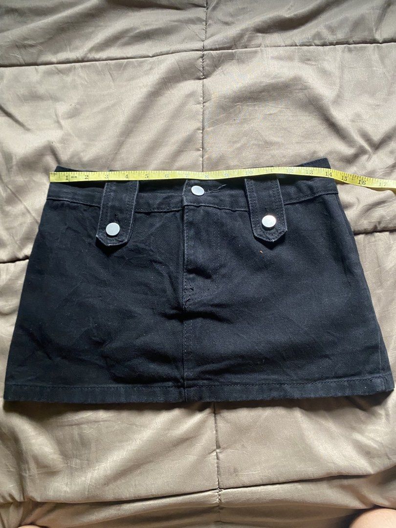 Kendall Black Denim Mini Skirt (Category: Skirts) located in Caloocan City. Submitted by lienzonius (Listing ID 1460727577, Image 1). Description: - Classic black denim mini skirt - Two front pockets and two back pockets - Belt loops at the waist - Button and zip closure - Approx. 13 inches in length - Approx. 28 inches in waist - Ideal for casual wear.
