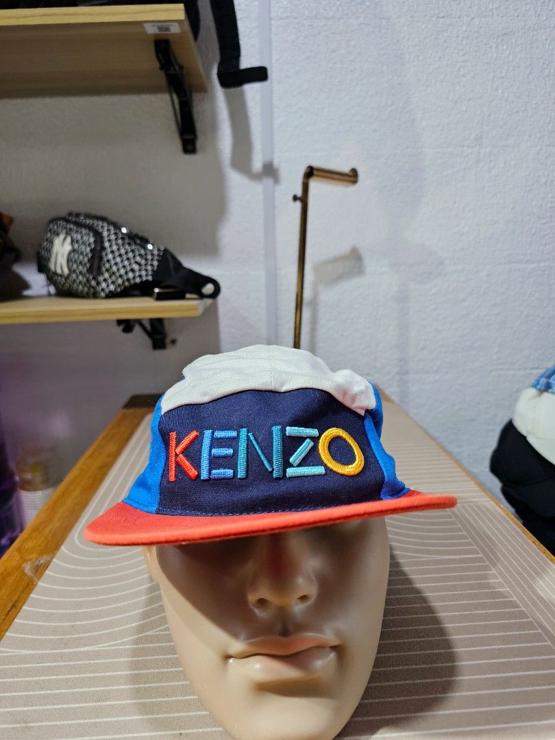 Kenzo kids colorblock cap (Category: Caps & Hats) located in Baguio. Submitted by kayeonlineshop (Listing ID 1460784335, Image 1). Description: -Kenzo Kids colorblock cap featuring a vibrant, multicolored embroidered logo on the front and a contrasting red flat brim.
