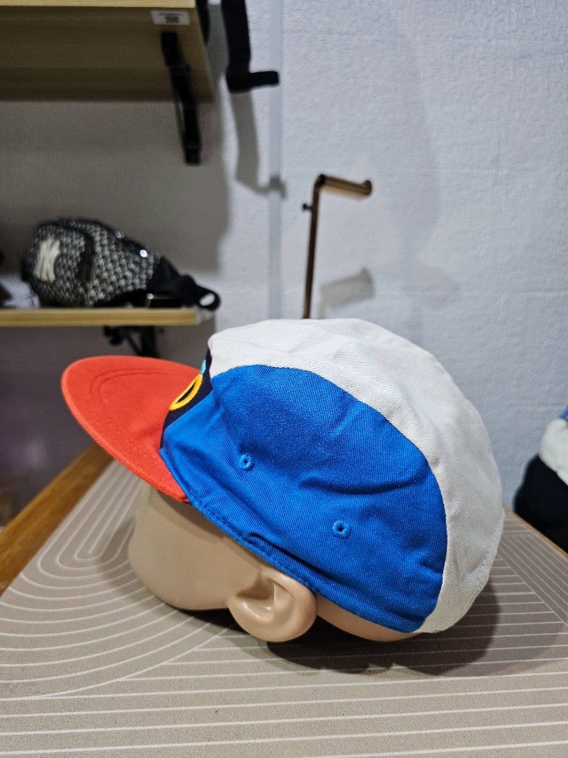 Kenzo kids colorblock cap (Category: Caps & Hats) located in Baguio. Submitted by kayeonlineshop (Listing ID 1460784335, Image 3). Description: -Kenzo Kids colorblock cap featuring a vibrant, multicolored embroidered logo on the front and a contrasting red flat brim.