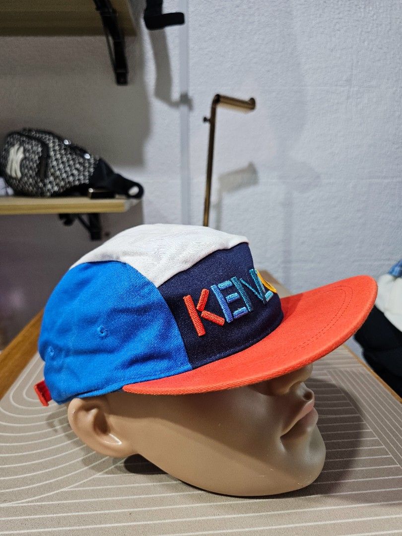 Kenzo kids colorblock cap (Category: Caps & Hats) located in Baguio. Submitted by kayeonlineshop (Listing ID 1460784335, Image 2). Description: -Kenzo Kids colorblock cap featuring a vibrant, multicolored embroidered logo on the front and a contrasting red flat brim.