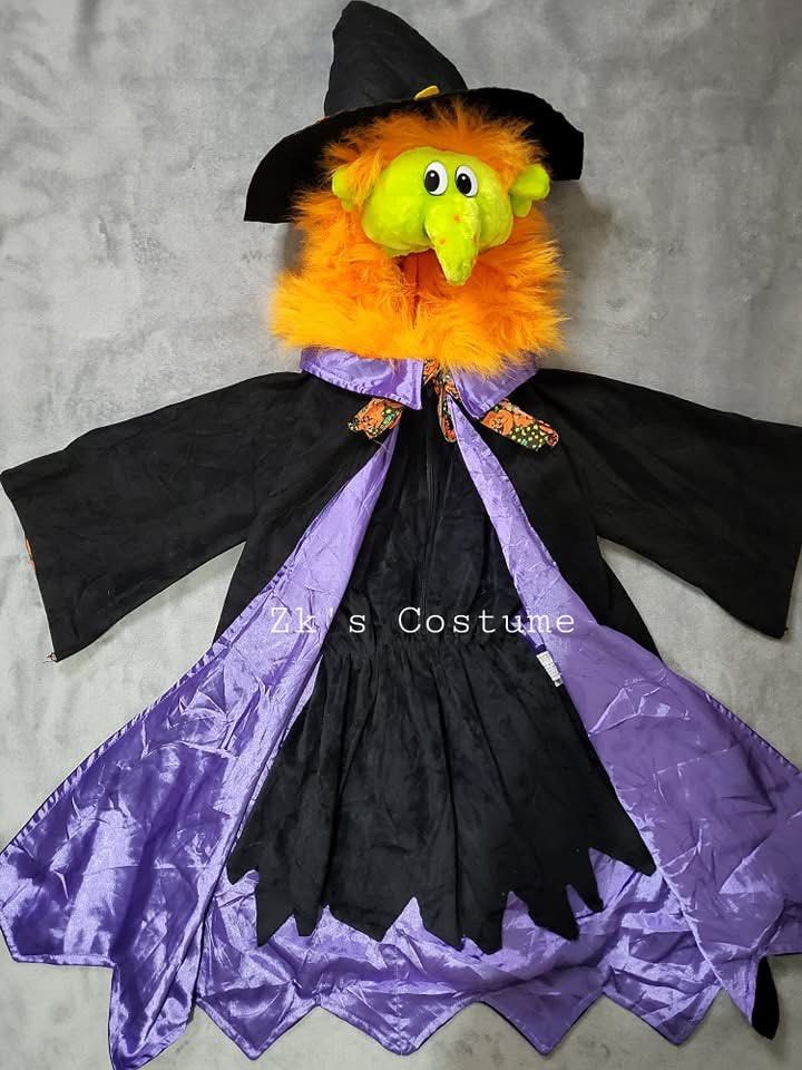 Kids Witch Costume with Hat and Plush Face (Category: Babies & Kids Fashion) located in Pasig City. Submitted by genyzk (Listing ID 1460812499, Image 1). Description: - Fun witch costume for Halloween! - Includes black cape with purple lining. - Comes with a matching witch hat. - Features a cute plush witch face with orange fluffy hair. - Zipper closure at the front for easy wear. - Ideal for dress-up parties and trick-or-treating..