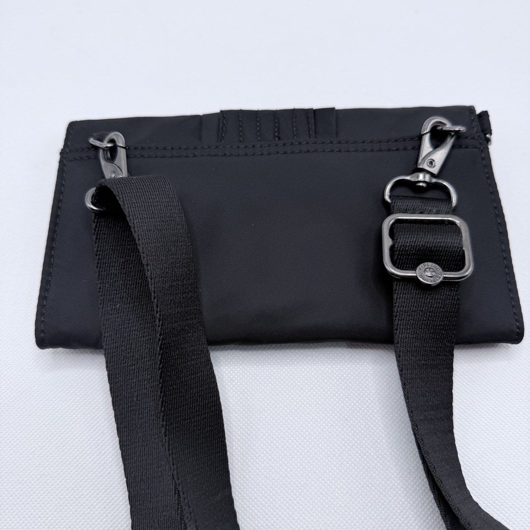 Kipling Orig sling wallet (Category: Wallets & Card holders) located in Quezon City. Submitted by ajandstevenshopscorner (Listing ID 1460802809, Image 3). Description: No other issue bukod sa leather lang Still maganda body and strap Usable pa pwede naman tanggalin ang leather kasi magnetic closure Philcoa Qc location.