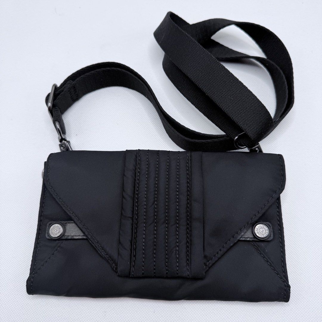 Kipling Orig sling wallet (Category: Wallets & Card holders) located in Quezon City. Submitted by ajandstevenshopscorner (Listing ID 1460802809, Image 1). Description: No other issue bukod sa leather lang Still maganda body and strap Usable pa pwede naman tanggalin ang leather kasi magnetic closure Philcoa Qc location.