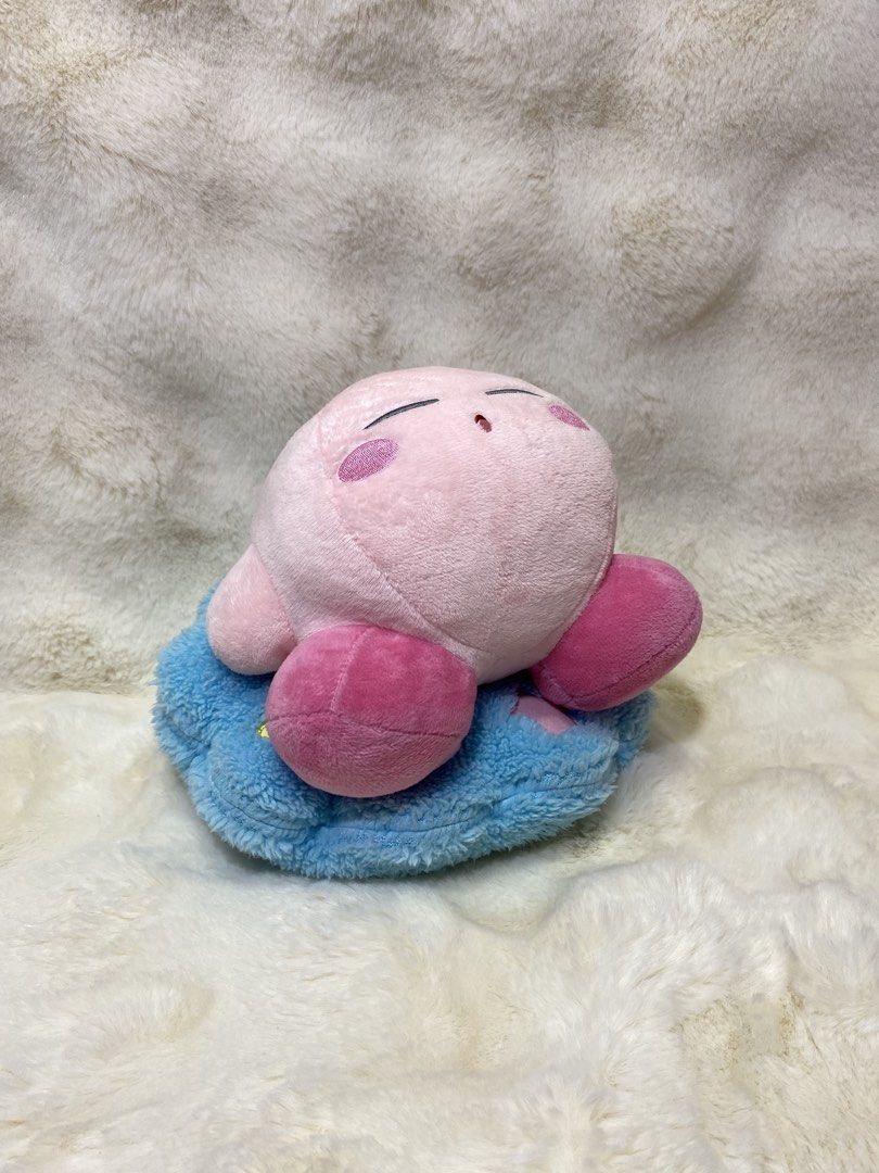 Kirby Plush Toy on Blue Cloud (Category: Plushies & Soft Toys) located in Kalibo. Submitted by ollie_stuffshop (Listing ID 1460865738, Image 1). Description: 19cm x 21cm Before you send your inquiries: ❗️Last Price is already posted ❗️Manage your expectations, WYSIWYG ❗️May need washing ❗️Dropoff is every Wednesday & Sunday - Adorable Kirby plush sitting on a fluffy blue cloud. - Made with soft and squishy material for ultimate comfort. - A must-