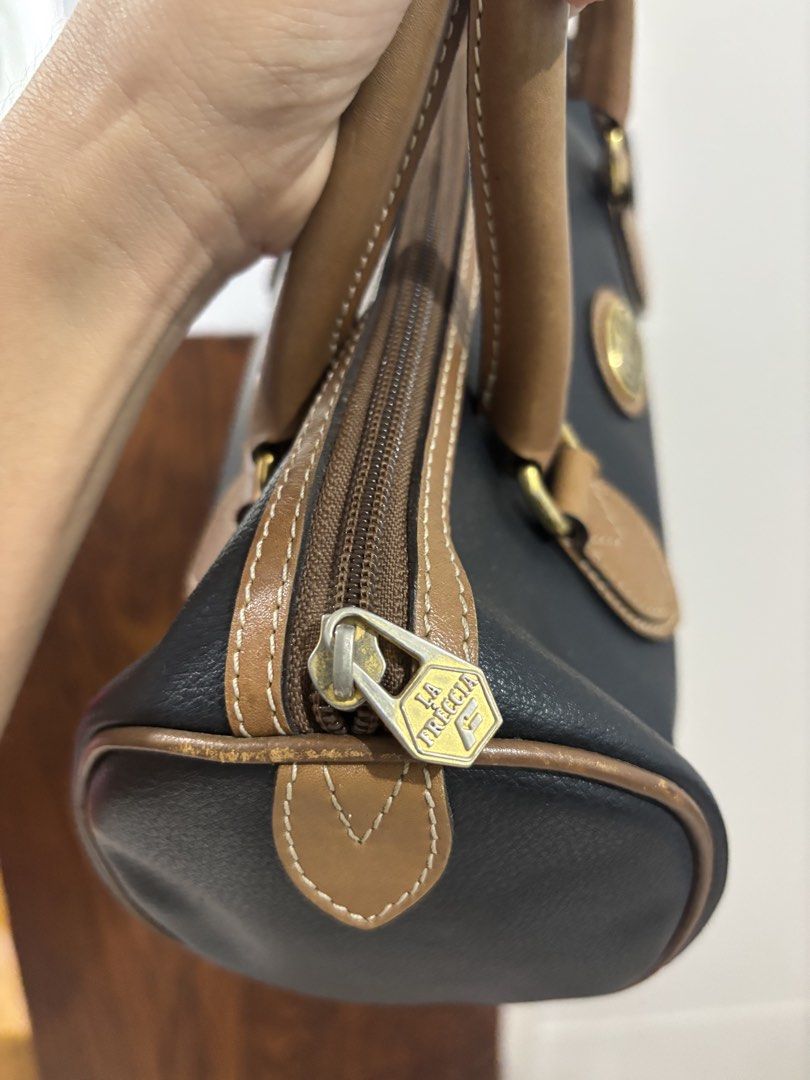 LA Freccia Italy (Category: Shoulder Bags) located in Calamba. Submitted by alnsurplus.028 (Listing ID 1460733475, Image 3). Description: La Freccia Handbag only With minimal signs of use Still good condition We ship nationwide Loc: Calamba, Laguna .
