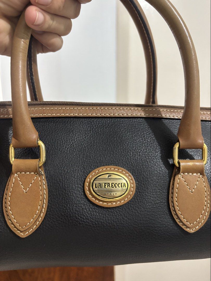 LA Freccia Italy (Category: Shoulder Bags) located in Calamba. Submitted by alnsurplus.028 (Listing ID 1460733475, Image 2). Description: La Freccia Handbag only With minimal signs of use Still good condition We ship nationwide Loc: Calamba, Laguna .