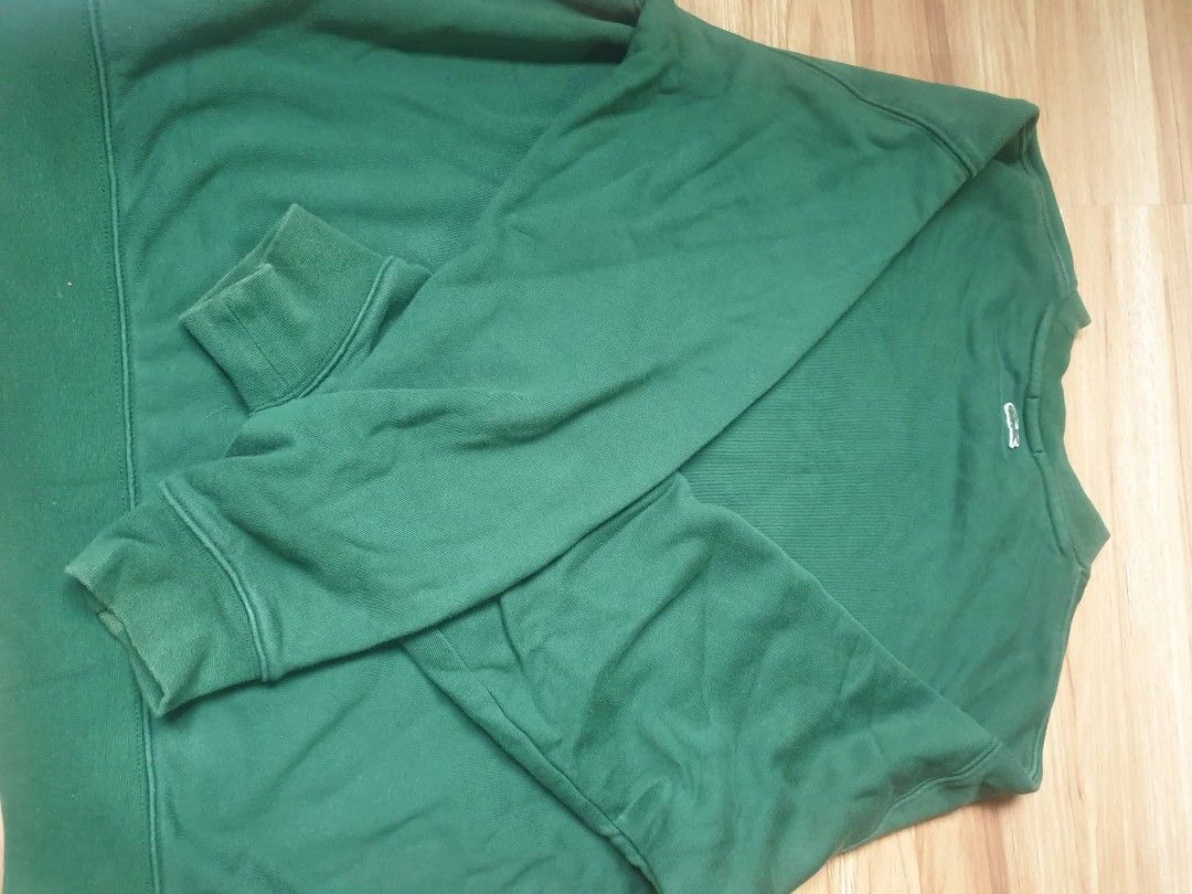 Lacoste green crewneck sweatshirt (Category: Coats, Jackets and Outerwear) located in Paranaque City. Submitted by nvdluxurygoods (Listing ID 1460767049, Image 3). Description: Fors sale: Authentic green Lacoste crewneck sweatshirt -Unisex for men and women -No flaws, no issue, authentic guaranteed. -♡selling price Color may vary due to lighting, actual color is dark green..