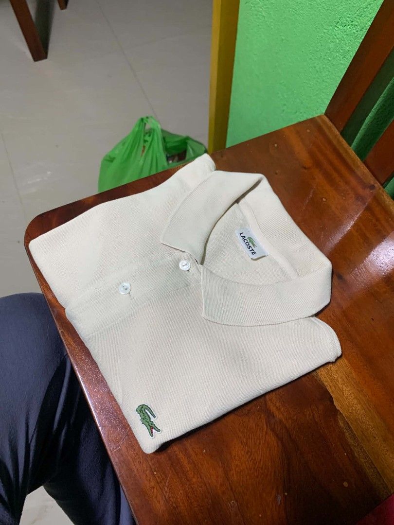 Lacoste polo shirt (Category: Tshirts & Polo Shirts ) located in Angeles City. Submitted by giventrifteditem (Listing ID 1460868806, Image 1). Description: pm for dets open vc.