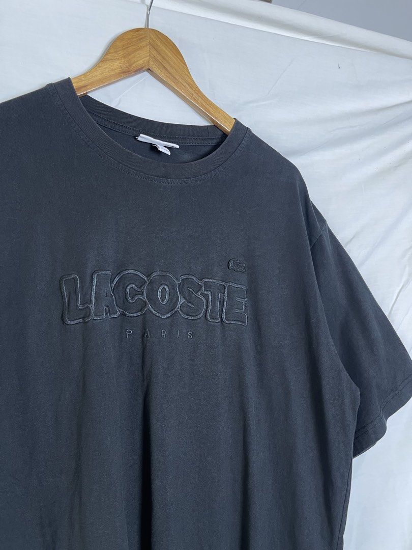 Lacoste T-shirt (Category: Tshirts & Polo Shirts ) located in Manila. Submitted by noahcastilljos363 (Listing ID 1460834276, Image 3). Description: - Classic black Lacoste t-shirt - Features a small woven Lacoste logo tag on the side - Simple and timeless design - Ideal for everyday casual wear.