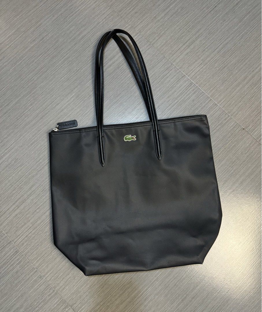 Lacoste Zip-Tote bag (Category: Tote Bags) located in Manila. Submitted by mzcollection_349 (Listing ID 1460728762, Image 1). Description: FOR SALE 💌♥️ LACOSTE BAG.🐊👜 LARGE ZIP-TOTE BLACK COLOR GOOD AS NEW CONDITION NO HIDDEN ISSUES.⚠️.