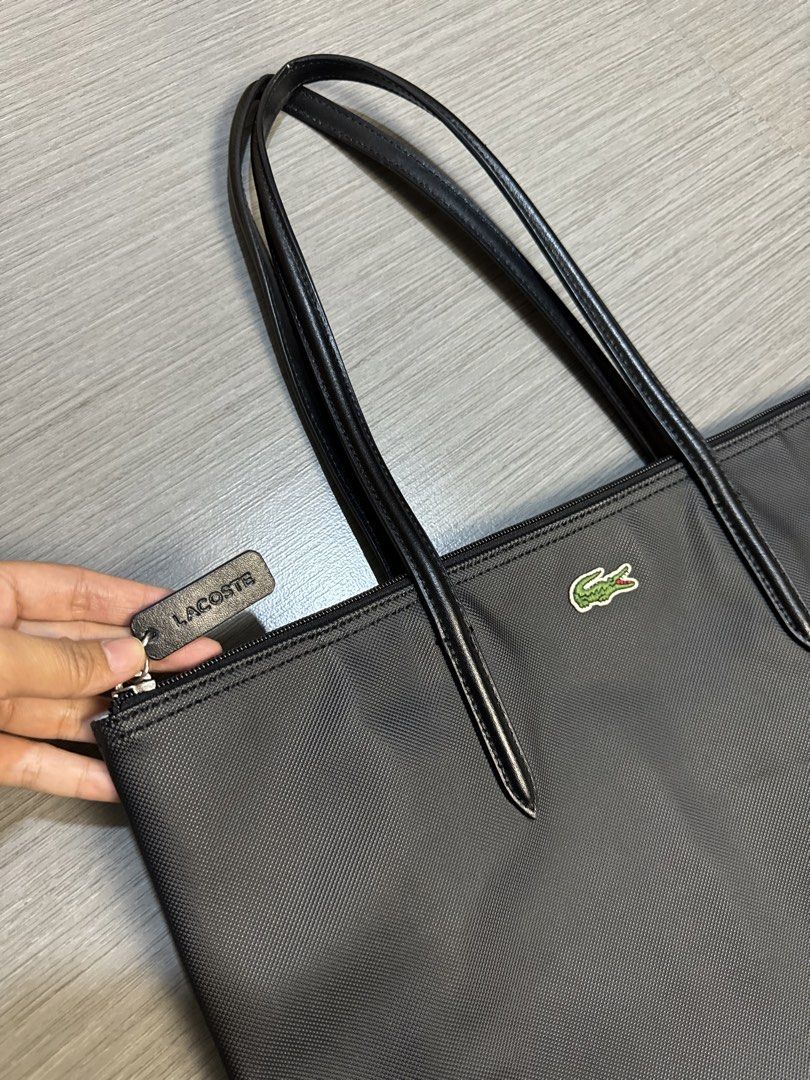 Lacoste Zip-Tote bag (Category: Tote Bags) located in Manila. Submitted by mzcollection_349 (Listing ID 1460728762, Image 2). Description: FOR SALE 💌♥️ LACOSTE BAG.🐊👜 LARGE ZIP-TOTE BLACK COLOR GOOD AS NEW CONDITION NO HIDDEN ISSUES.⚠️.