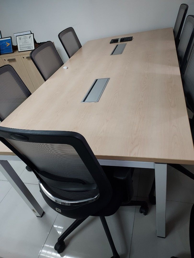 Large Wooden Conference Table with Built-in Outlets (Category: Office Furniture & Fixtures) located in Makati City. Submitted by chinitajan (Listing ID 1460833926, Image 1). Description: FOR SALE - Spacious conference table - Light wood finish - Ideal for office meetings and collaborations - Chairs not included - Sturdy and ready for use.