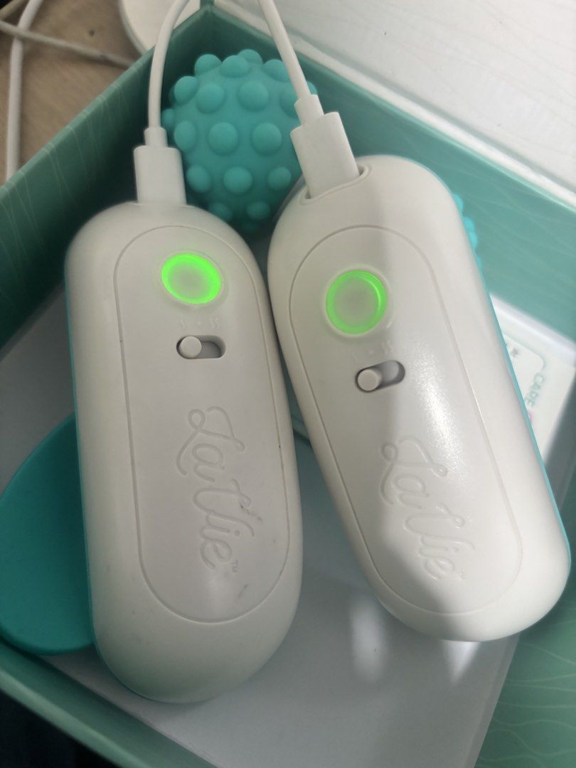 LaVie Lactation Massage Roller & Warming Pads (Category: Breastfeeding & Bottle Feeding) located in Pasig City. Submitted by 7preloved (Listing ID 1460813198, Image 2). Description: - LaVie Lactation Massage Roller & Warming Pads - Designed to improve milk flow and save breastfeeding moms time - Set includes: 1 Lactation Roller, 2 Warming Pads, 2 Charging Cables, 1 Storage Pouch - Warming pads feature a green light indicator when in use - Essenti
