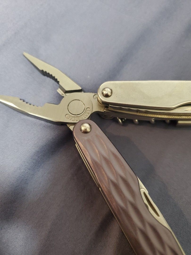 Leatherman Juice XE6 Multi-tool with Pouch and Box (Category: Craft Supplies & Tools) located in Cebu City. Submitted by jonhk123 (Listing ID 1460840985, Image 2). Description: Leatherman Juice XE6 multi-tool. New, Includes the original box, user guide, and leather pouch. 1. Needlenose Pliers 2. Regular Pliers 3. Hard-wire Cutters 4. Wire Cutters 5. 420HC Knife 6. 420HC Serrated Knife 7. Saw 8. Spring-action Scissors 9. Awl 10. Can Opener 11. Bot