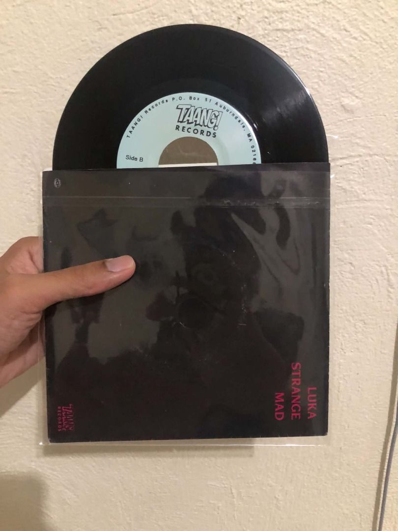 Lemonheads - Strange Mad 7" Vinyl Record (Category: Vinyls) located in Cebu City. Submitted by bartmanual92 (Listing ID 1460833325, Image 2). Description: - Luka Mad strange 7-inch vinyl record - Label: Taang! Records - Comes in a black sleeve with artwork - A must-have for any vinyl collection.