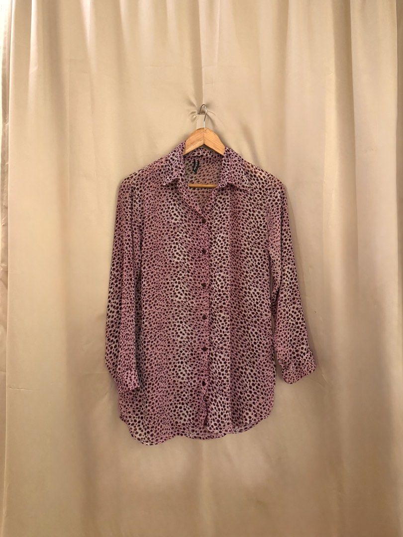 Leopard print buttondown statement top (Category: Blouses) located in Manila. Submitted by 414studio (Listing ID 1460899609, Image 1). Description: Sheer and classy style.