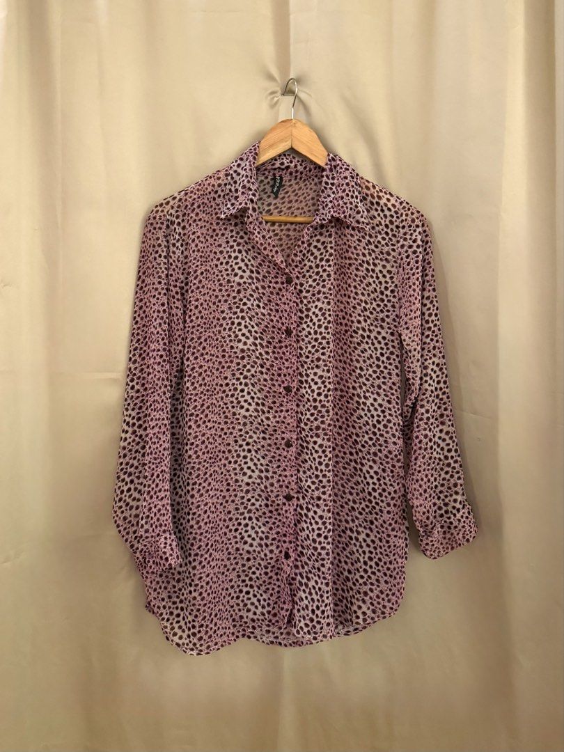 Leopard print buttondown statement top (Category: Blouses) located in Manila. Submitted by 414studio (Listing ID 1460899609, Image 2). Description: Sheer and classy style.