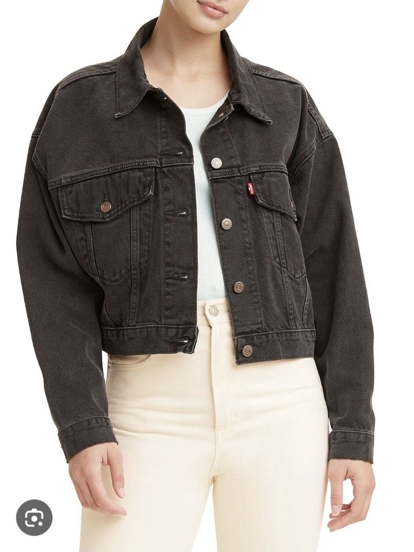 Levi's Black Denim Trucker Jacket (Category: Coats, Jackets and Outerwear) located in Quezon City. Submitted by corrnic (Listing ID 1460736620, Image 1). Description: - Classic black Levi's denim trucker jacket - Button front and cuffs - Two chest pockets with button closures - Side pockets - Cropped fit - Versatile wardrobe staple.