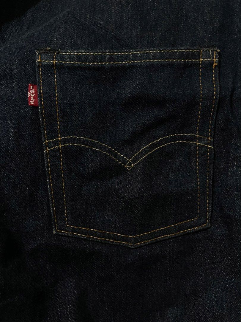 Levi's Denim Tote Bag with Back Pocket (Category: Tote Bags) located in Donsol. Submitted by saksthriftavenuebyluckymaria8 (Listing ID 1460881446, Image 3). Description: - Classic Levi's denim tote bag - Dark wash blue color - Features iconic Levi's back pocket design - Includes leatherette Levi's logo patch - White interior lining with a small pocket - Spacious and ideal for everyday use 17in height .
