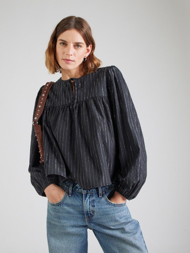 Levi's Josephine Long Sleeve Black Top (Category: Blouses) located in Pasig City. Submitted by brownbagph (Listing ID 1460886431, Image 2). Description: Product Features: Approx. 22" long Notched V-neck Long sleeves Cotton, viscose, Lurex.
