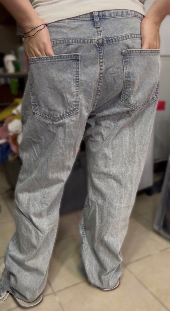 Light Wash Distressed Baggy Jeans (Category: Jeans) located in Surigao. Submitted by boonz71_1971 (Listing ID 1460888145, Image 2). Description: “Closet clean-out - PluS SiZe” - Waist 40” Length 40” - Light wash baggy jeans - Distressed details with rips and tears - Button fly closure - Waist: approx. 36 inches - Inseam: approx. 30 inches - Perfect for a casual streetwear style.