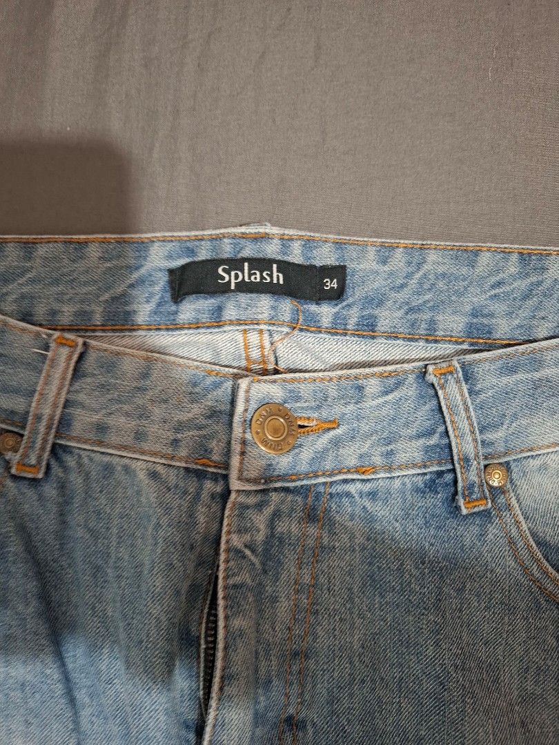 light-wash straight or slightly bootcut denim jeans (Category: Jeans) located in Bacoor. Submitted by manilasena (Listing ID 1460894822, Image 3). Description: Splash Bootcut jeans Size 34 on tag.