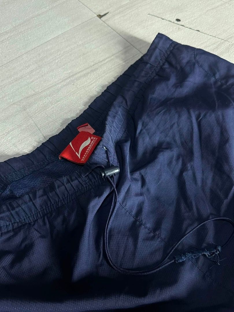 li-ning track pants (Category: Jeans) located in Manila. Submitted by nb_thriftshop (Listing ID 1460901081, Image 3). Description: li ning track pants waist 27 to 35 length 39 leg hole 9 no issue need wash.