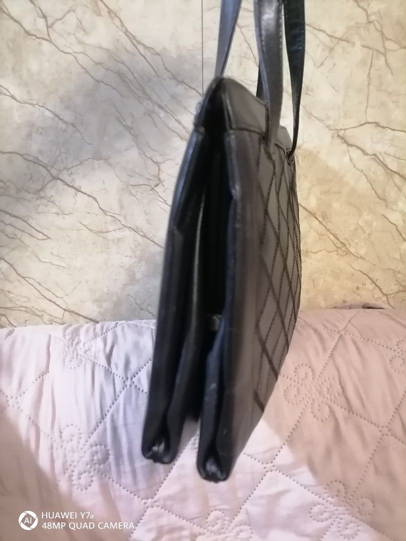 Lizard Skin Black Patchwork Leather Tote Bag (Category: Tote Bags) located in Naga. Submitted by mrwisethrifter (Listing ID 1460820064, Image 3). Description: - Classic black leather tote bag - Unique patchwork design on the front - Two comfortable top handles - Spacious interior for all your essentials - Versatile for everyday use or evening outings - A timeless accessory to elevate any outfit.