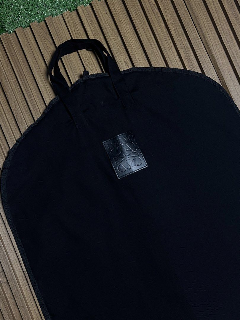 LOEWE - GARMENT BAG (Category: Formal Shirts) located in Bacolod City. Submitted by timelessbyjosh (Listing ID 1460899163, Image 2). Description: SIZE : ACTUAL COLOR : BLACK COLOR RATE : 9. 5 OUT OF 10 CONDITION : EXCELLENT MATERIAL : 100 % COTTON MADE IN : FLAWS : SMALL STAIN ( SEE LAST PHOTO FOR REFERENCE ) DIMENSIONS LENGTH - WIDTH - MEASUREMENT TAKEN WHILE LAYING FLAT..
