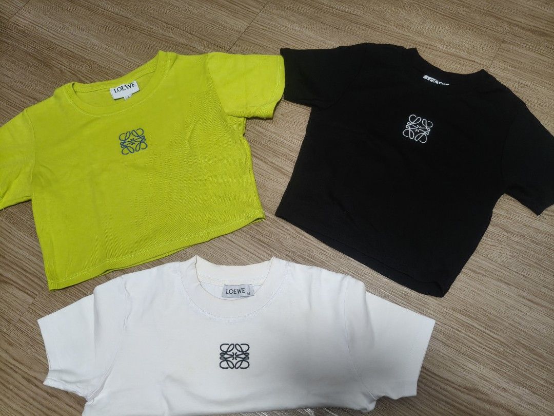 Loewe Anagram Logo T-Shirts (3 Colors) Bundle (Category: Shirts) located in San Fernando. Submitted by pollygirl08 (Listing ID 1460850187, Image 1). Description: Selling three Loewe t-shirts. Got a lime green, black, and white one. All have the classic Anagram logo embroidered on the chest. Good quality cotton. Great basics to have in your wardrobe. Let me know if you have questions!.