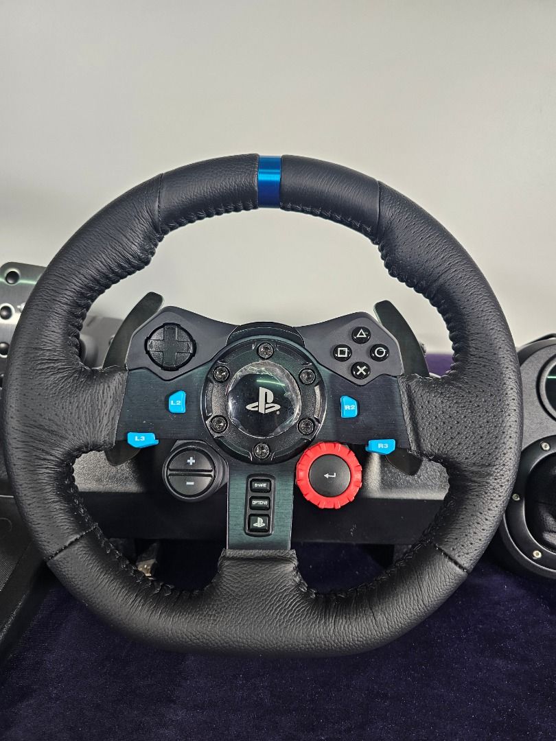 Logitech G29 + Pedals + Driving Force Shifter | Mint 9.5/10 (Category: PlayStation) located in Caloocan City. Submitted by elleandhermusings (Listing ID 1460828842, Image 3). Description: Logitech G29 Driving Force complete racing setup. Condition: 9.5/10 — mint / near-pristine Includes: G29 steering wheel 3-pedal set Logitech Driving Force 6-speed shifter Very clean and well maintained. Leather wheel and shifter show no significant wear, peeling