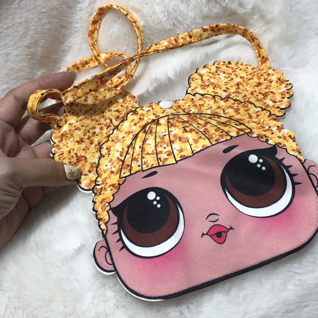 L.O.L Sling Bag (Category: Babies & Kids Fashion) located in Quezon City. Submitted by kitsune.treasures (Listing ID 1460784480, Image 1). Description: *First to pay policy! *1 day reservation only. Failure to pay on time, auto cancel. 📍Quezon City * MOD: J&T | Lalamove * MOP: GCASH | BPI 📦ON HAND AND READY TO SHIP! CONDITION: WHAT YOU SEE IS WHAT YOU GET. Dimensions: Kindly check the photos for the actual measurements. Please check all the pho