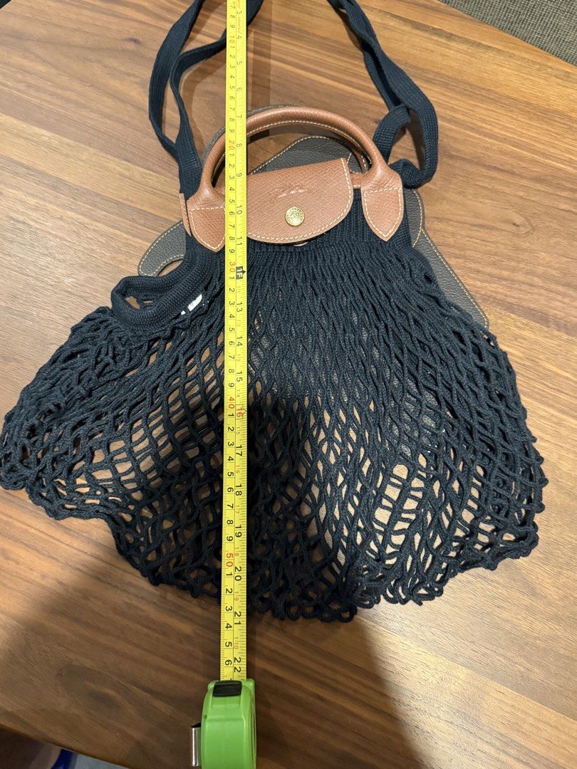 Longchamp Le Pliage Filet Shoulder Bag Black (Category: Beach Bags) located in Manila. Submitted by de_clutterph (Listing ID 1460798723, Image 2). Description: NEVER USED 100% Authentic if proven fake money back. - No damages and flaws, clean and in mint condition - Well kept in a dry box to prevent molds and damage PM for more info and pictures of the item.