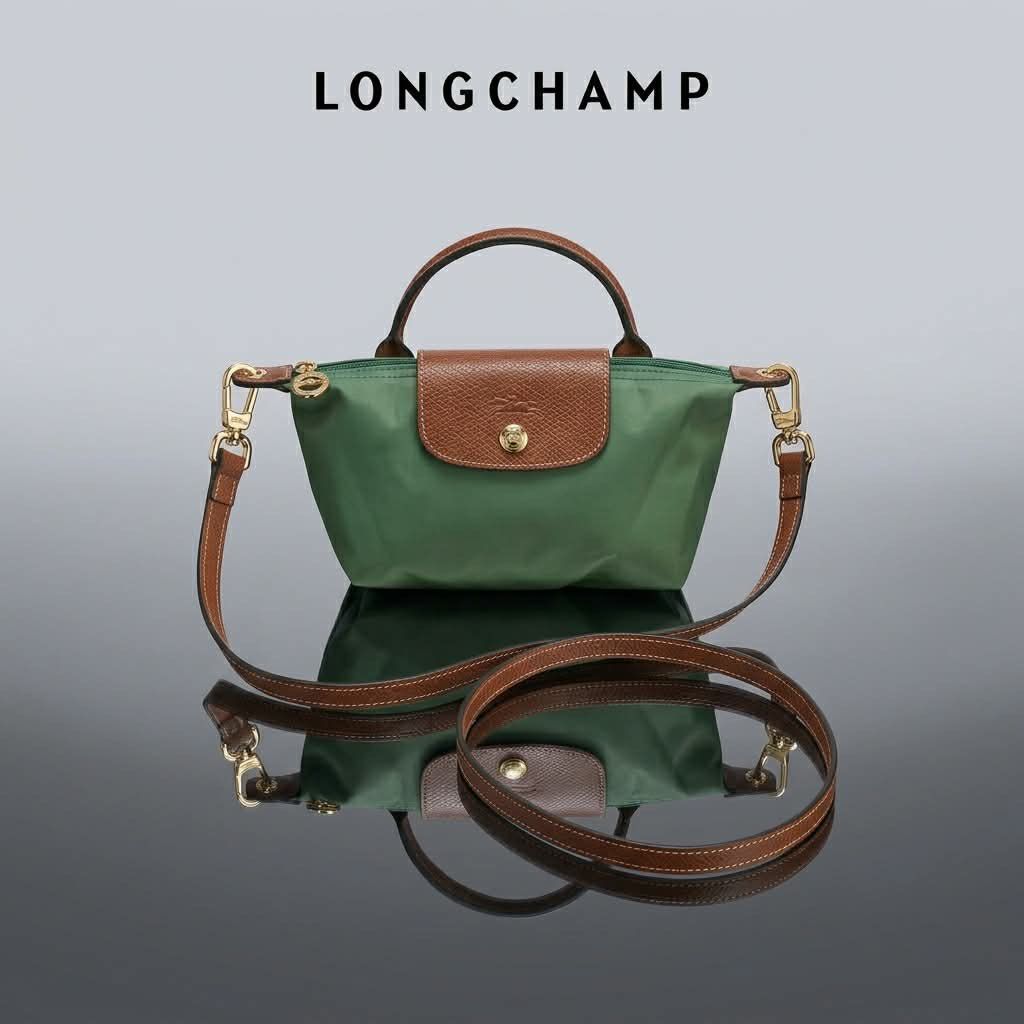 Longchamp Le Pliage Green Top Handle Bag with Strap (Category: Luxury Bags & Wallets) located in Carmen. Submitted by rr_thrifts (Listing ID 1460765360, Image 1). Description: - Green Longchamp Bag - Detachable Leather Strap Included - Elegant Gold Hardware Details - Premium Leather Trim and Handles - Versatile for Everyday Use - Can be Worn as Crossbody or Shoulder Bag.
