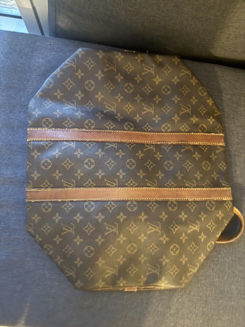 Lv Keepall 45 with strap (Category: Luxury Bags & Wallets) located in Taguig. Submitted by baghabitmnl (Listing ID 1460833311, Image 2). Description: - Louis Vuitton Keepall 45 - Classic Louis Vuitton monogram duffle bag - With long strap - Color: Brown canvas with leather trim - Closure: Zipper - Straps: Adjustable - Ideal for: Travel or everyday use .