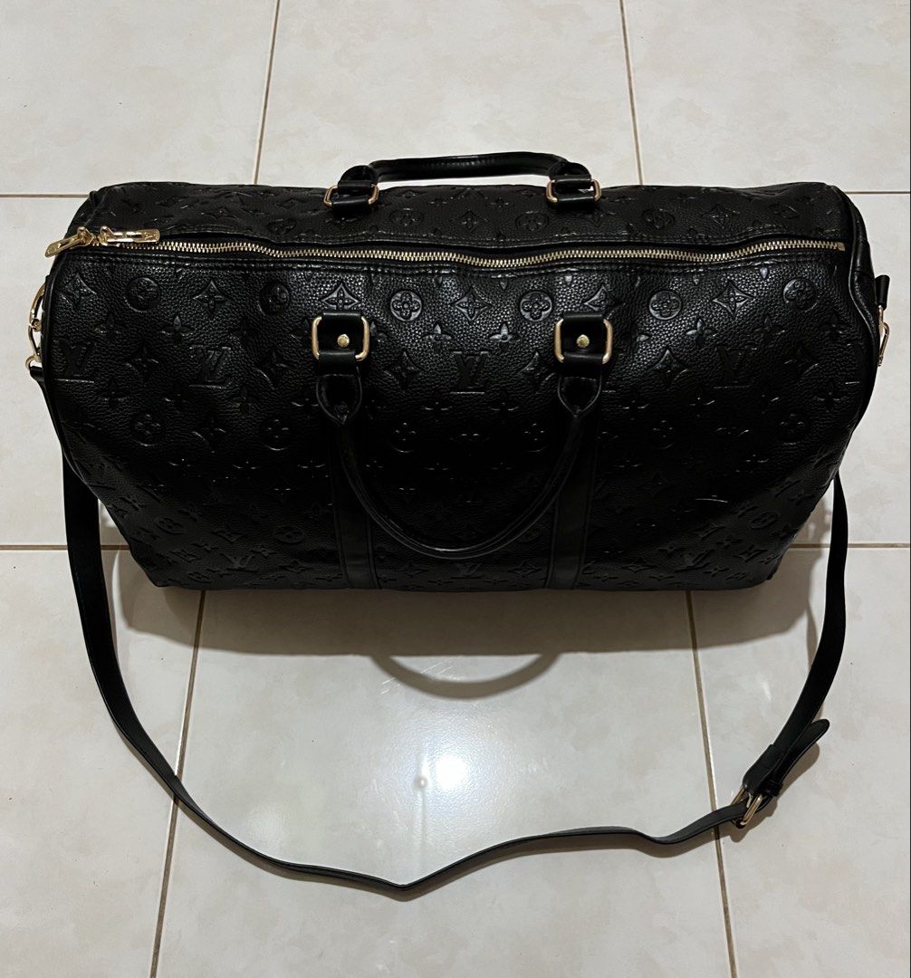 LOUIS VUITTON KEEPALL BANDOULIÈRE (Category: Briefcases) located in Cavite. Submitted by drip_syndicate (Listing ID 1460915850, Image 3). Description: EMBOSSED MONOGRAM CONDITION: 9.8/10 COLOR RATE: 9.8/10 NO ISSUE .