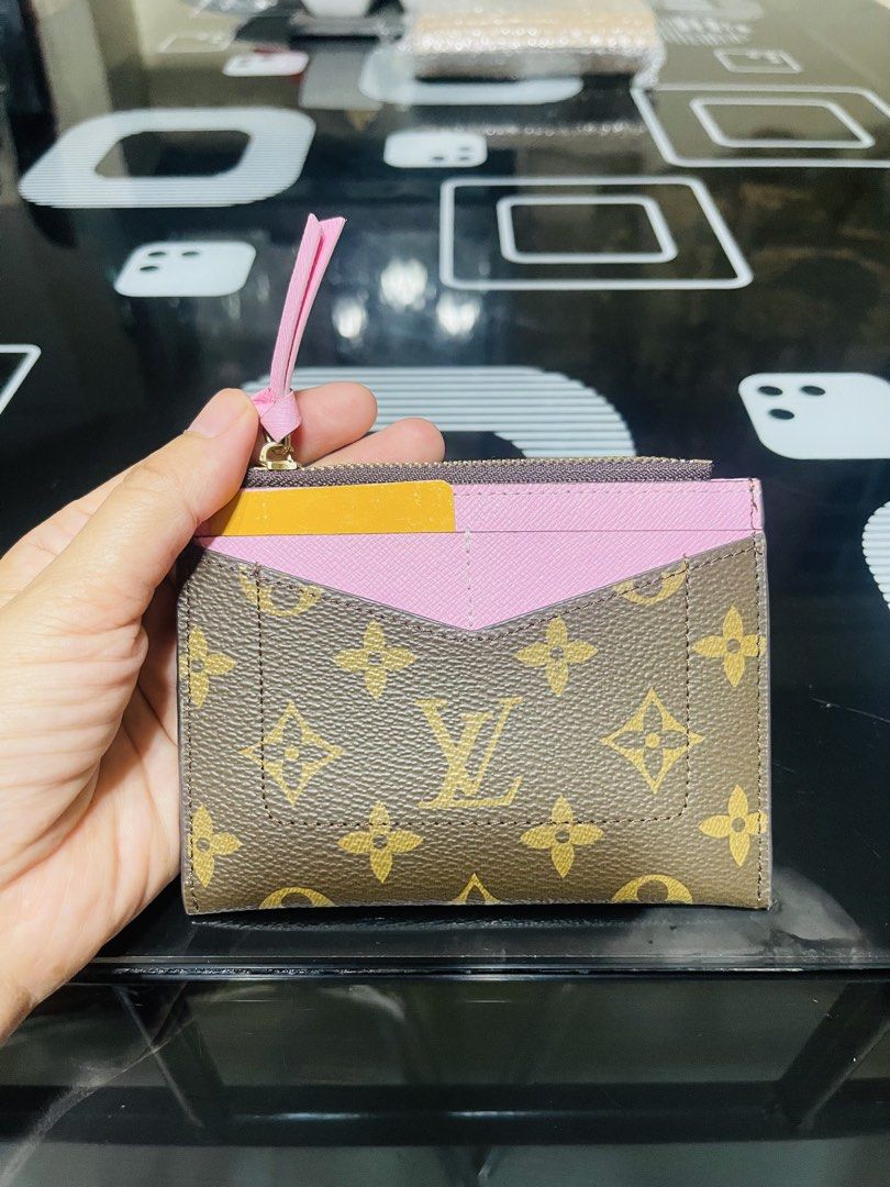 Louis Vuitton Monogram Canvas Pink Card Holder (Category: Luxury Bags & Wallets) located in Manila. Submitted by yhaan04 (Listing ID 1460726518, Image 1). Description: - Authentic Louis Vuitton card holder - Classic monogram canvas with pink interior - Zippered compartment for security - Multiple card slots for organization - Compact and pocket-friendly design.